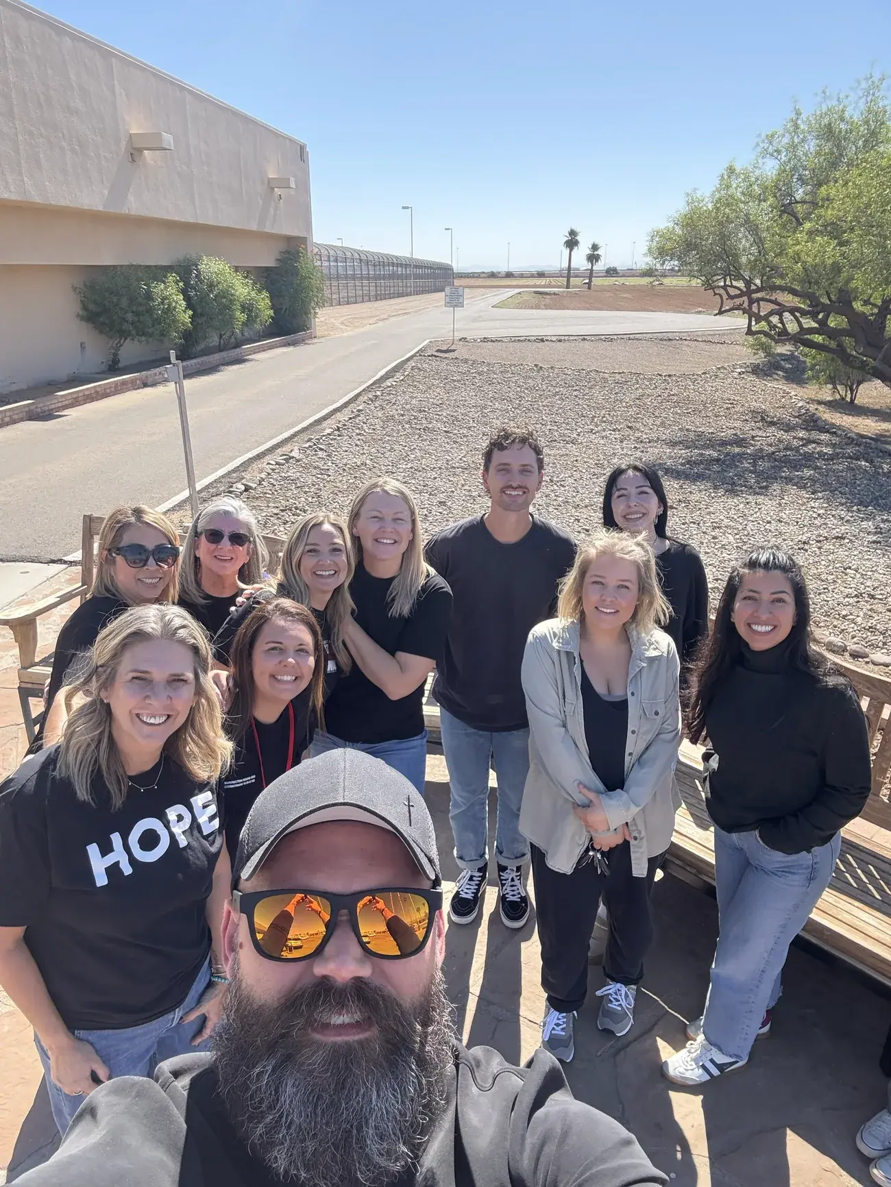 Forever Moms volunteers holding letters that spell HOPE