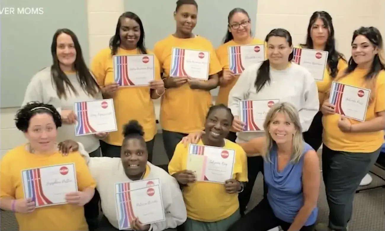 Forever Moms graduates gathered together at a celebration